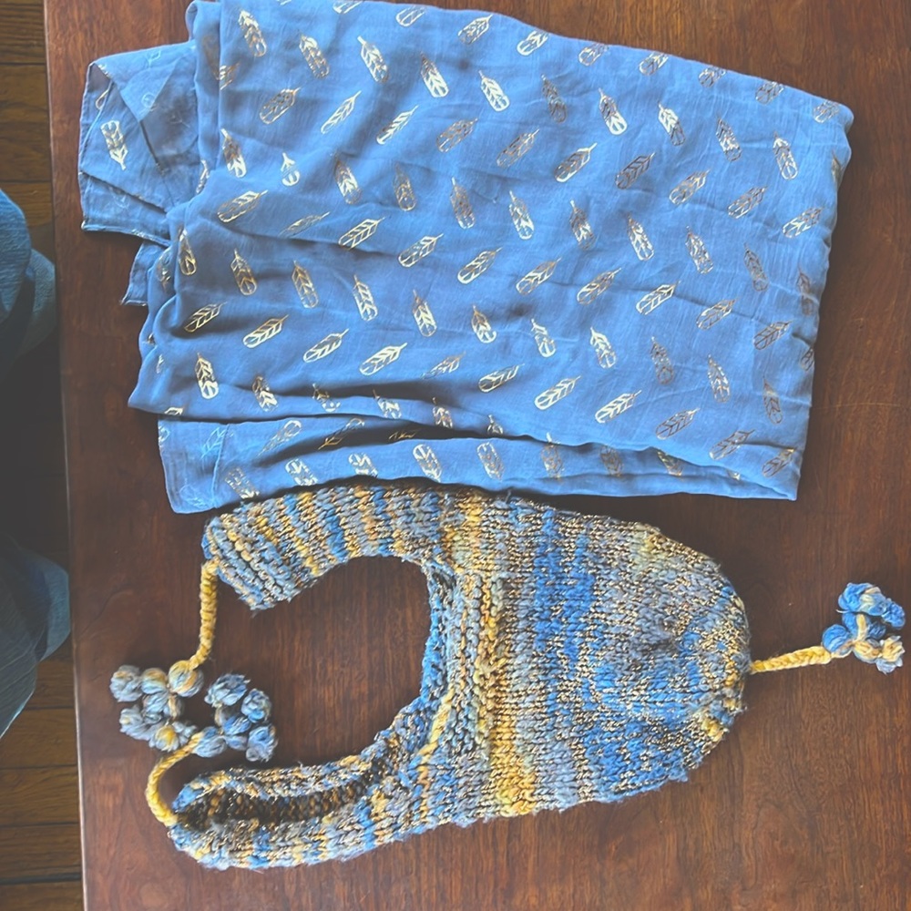 Gold, gray and blue knitted hat with gray and gold scarf